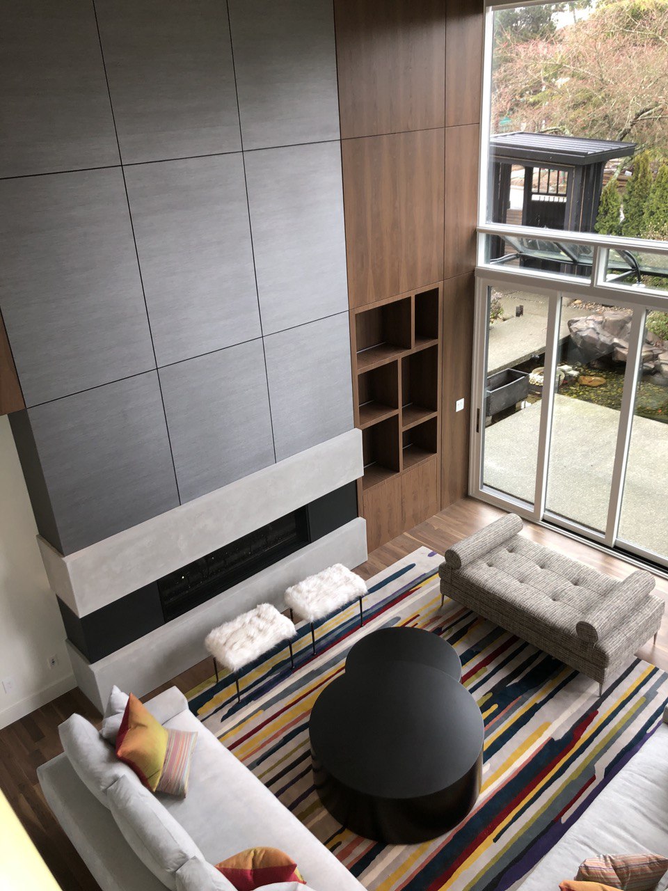Bright kitchen and dining area in Kitsilano Townhouse with custom cabinetry